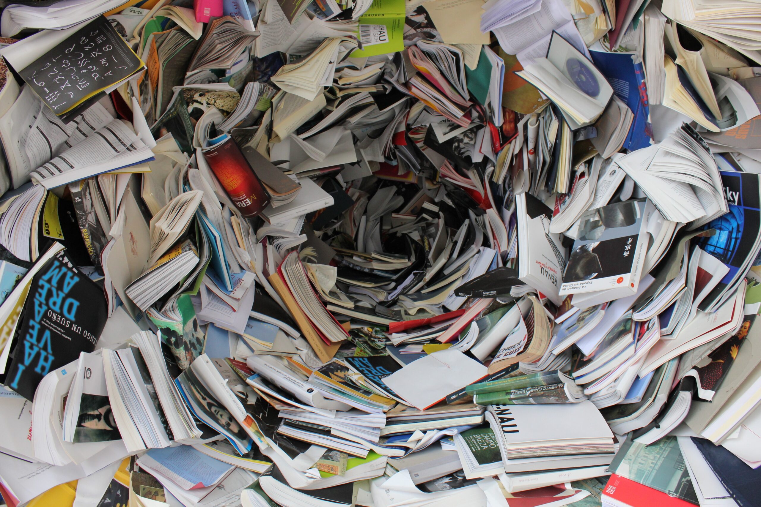 an overwhelming messy pile of books